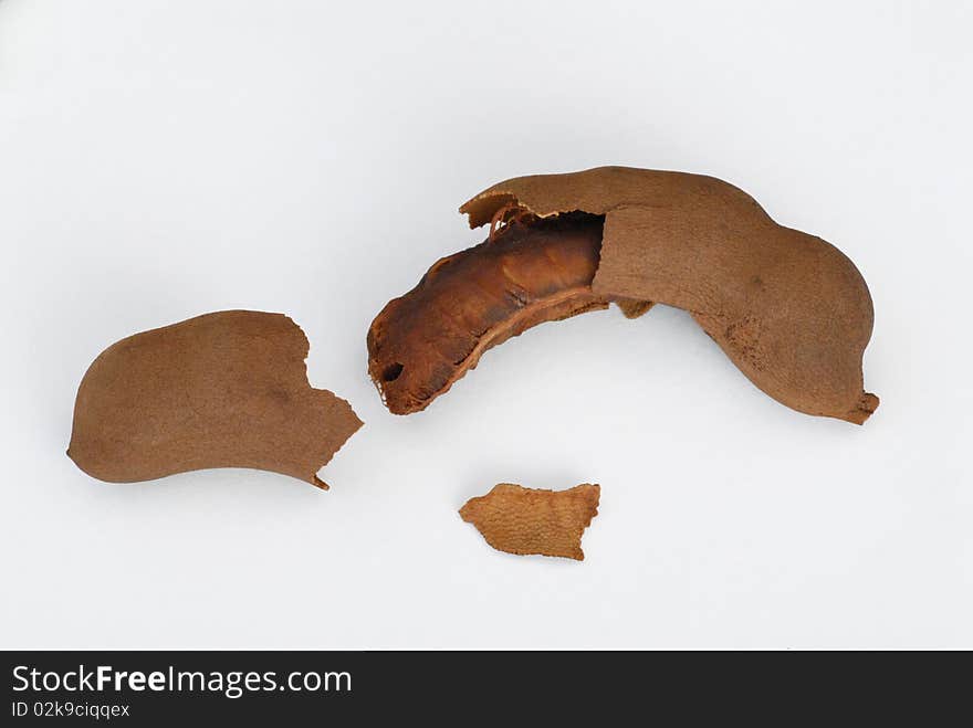 Tamarind fruit cut in two