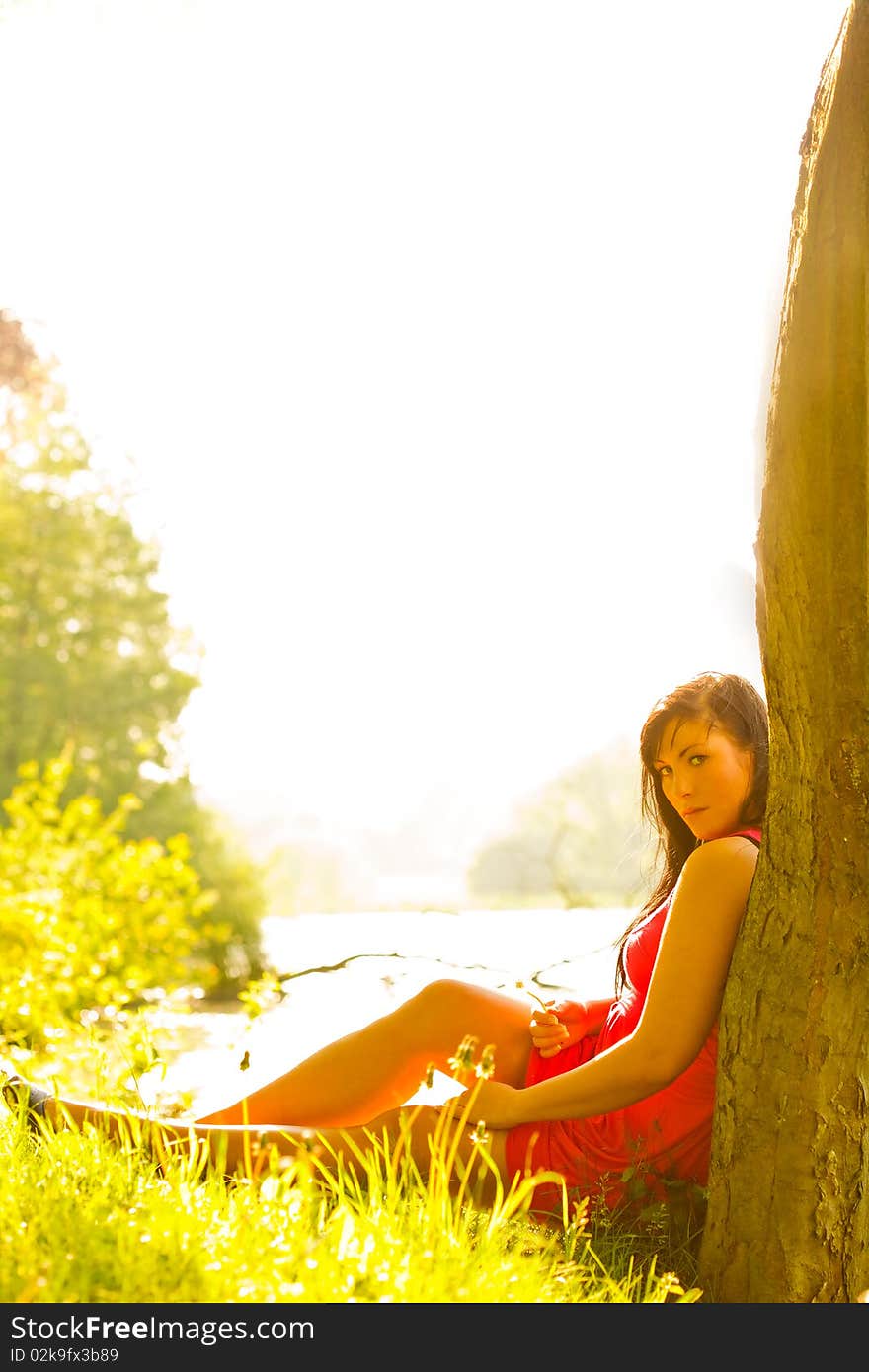 Outdoor girl in park relaxing feeling free. Outdoor girl in park relaxing feeling free