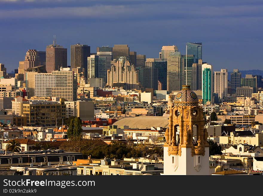 San Francisco at sunset seen from the Mission neighborhood. San Francisco at sunset seen from the Mission neighborhood.