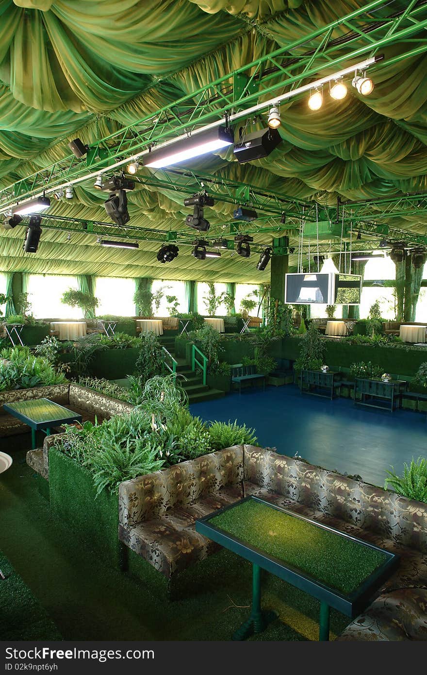 View of restaurant full of plants and flowers