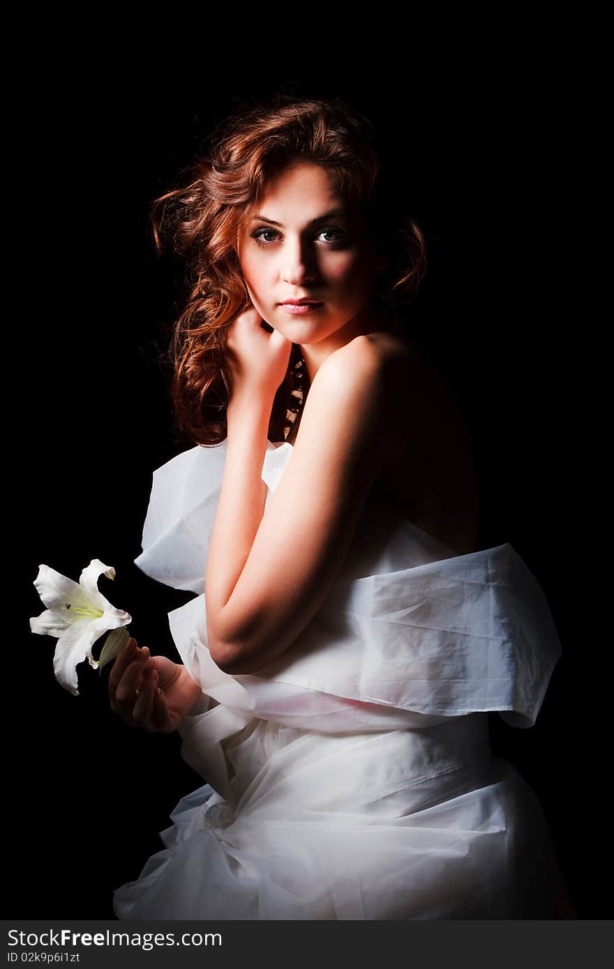 Portrait of a sweet young girl on black background. Portrait of a sweet young girl on black background.