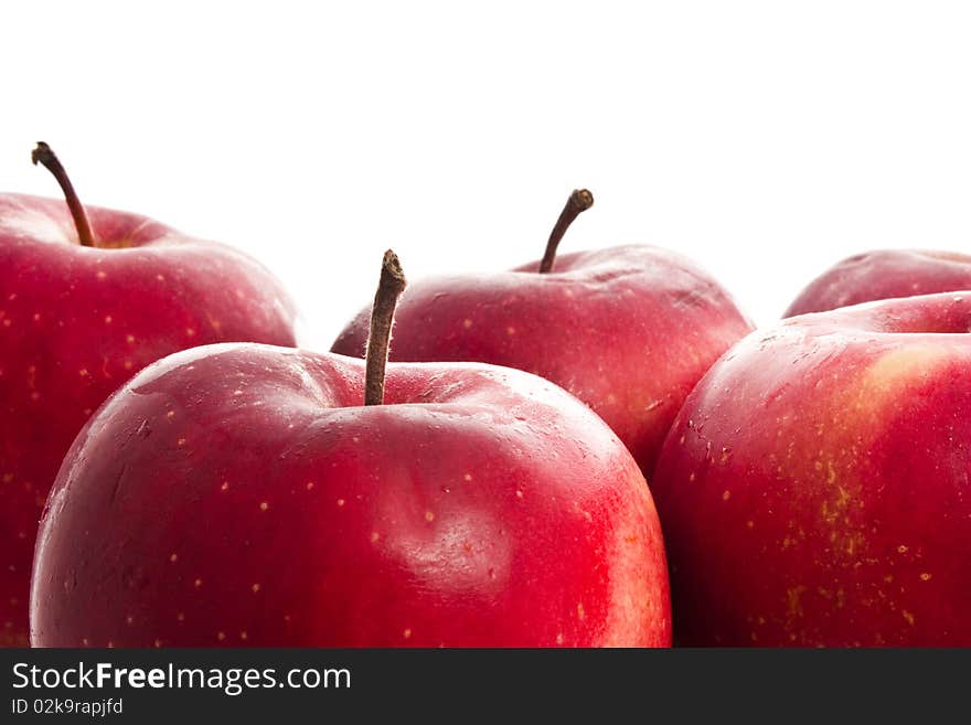 Red apples isolated on white close-up background