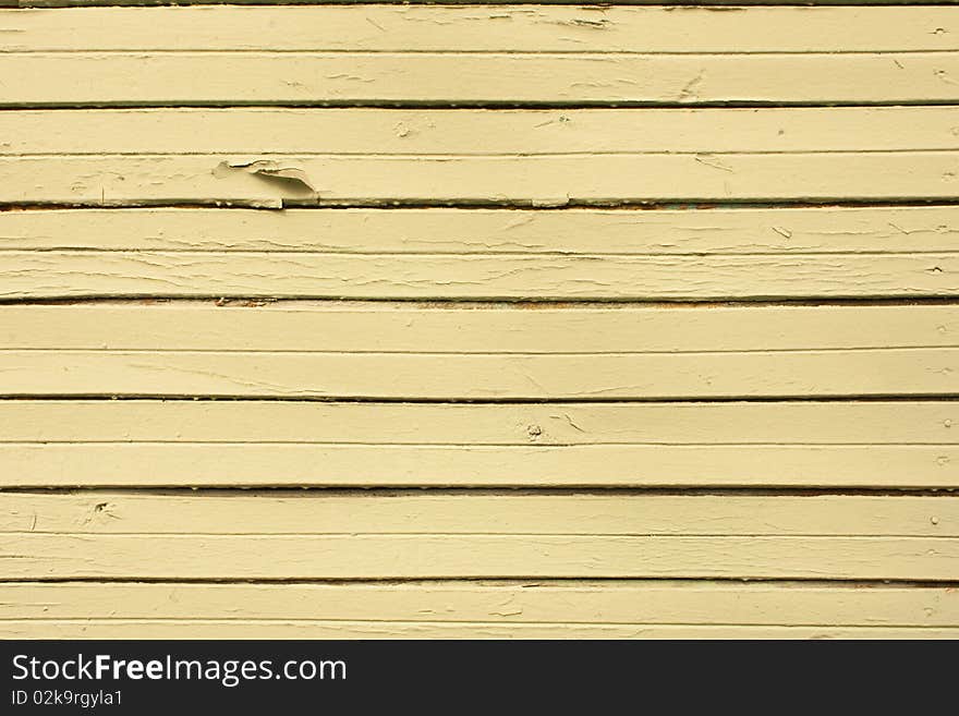 Vintage yellow wooden wall as background