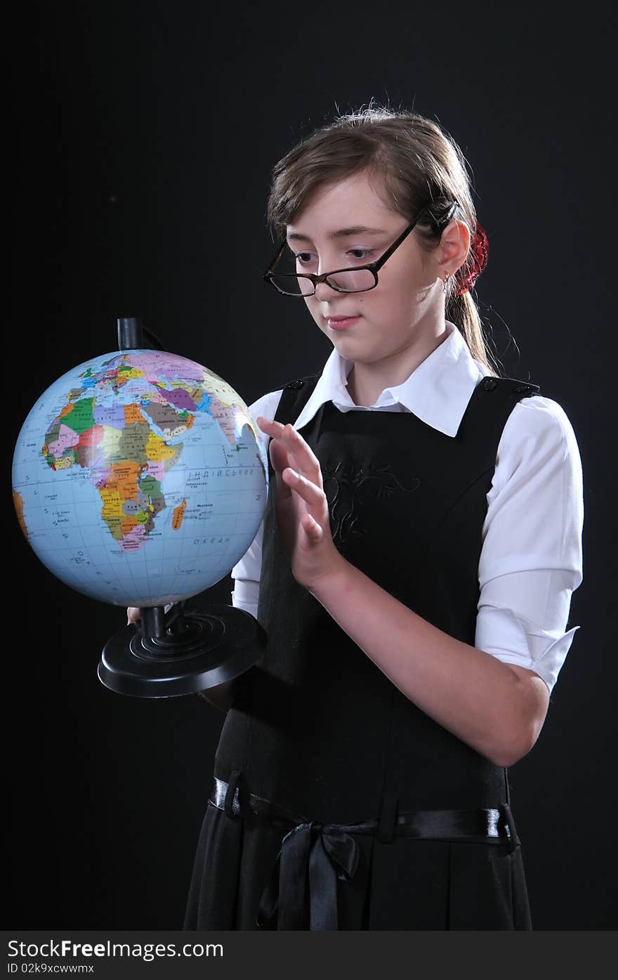 Schoolgirl and globe