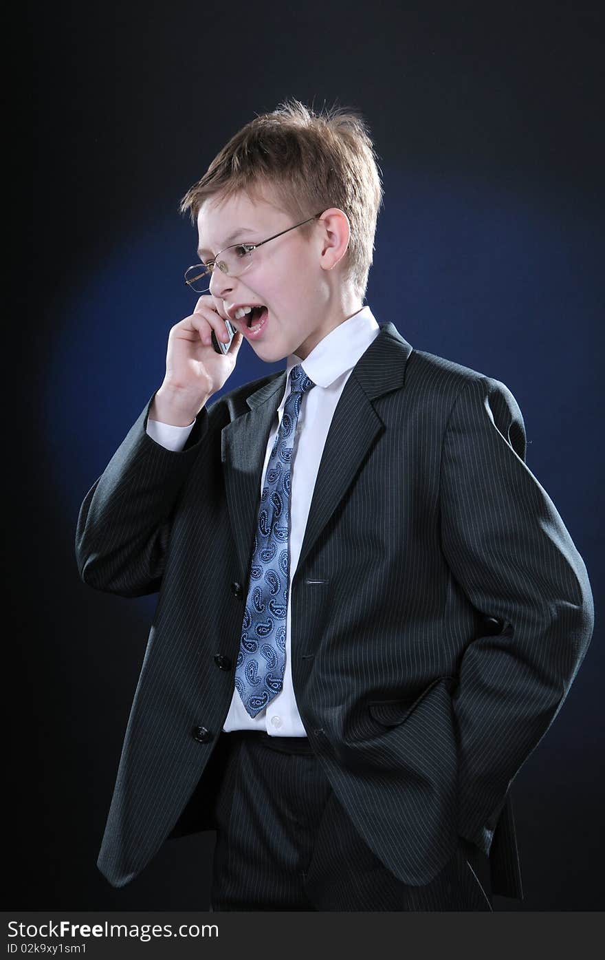 Boy in Suit on Cellphone