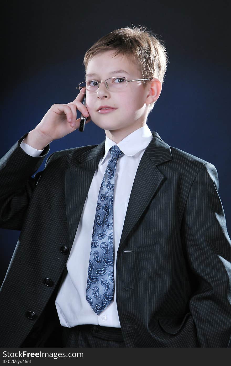 Boy in Suit on Cellphone