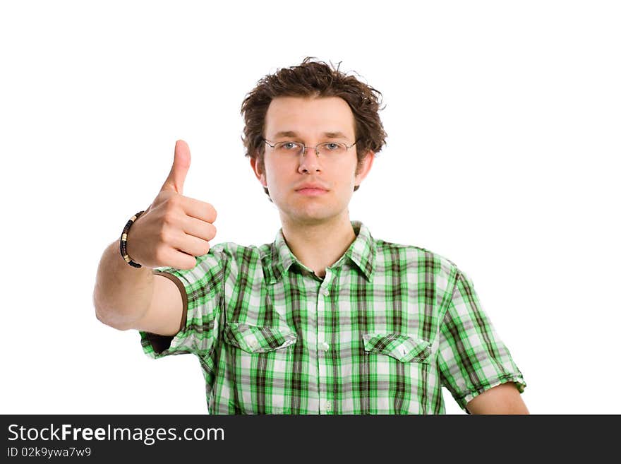 Young adult with thumbs up gesture, isolated on white background, selective focus on hand, face is lightly blurred. Young adult with thumbs up gesture, isolated on white background, selective focus on hand, face is lightly blurred