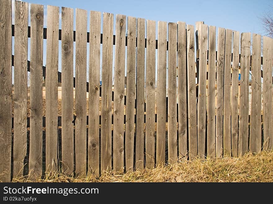 Dachnyy wooden fence from tree pine