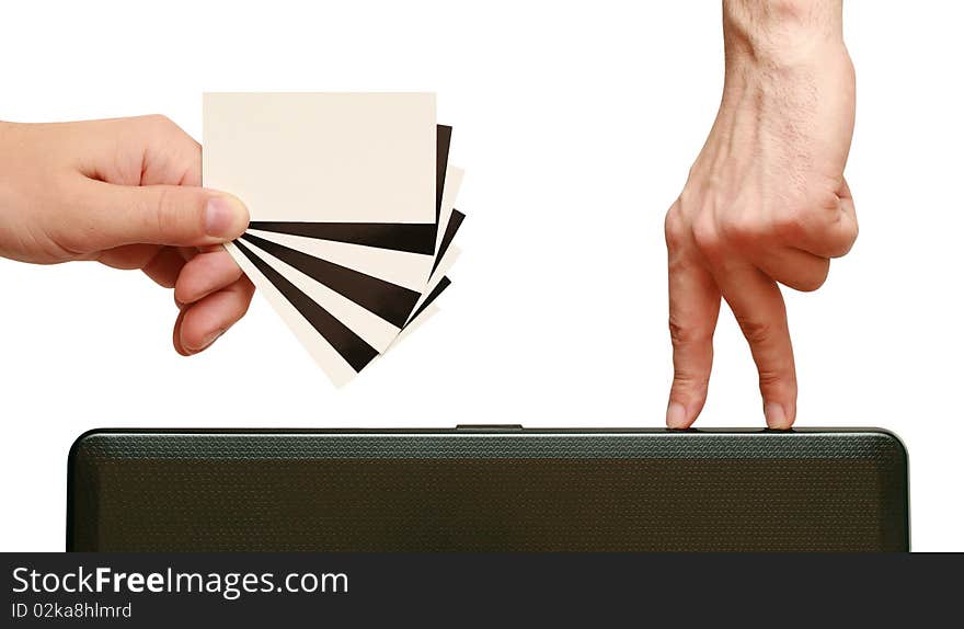 Fingers are going to contrast business card in hand on white background