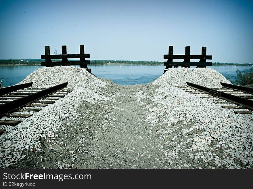 Deadlock on the railroad. but behind this barrier extends River