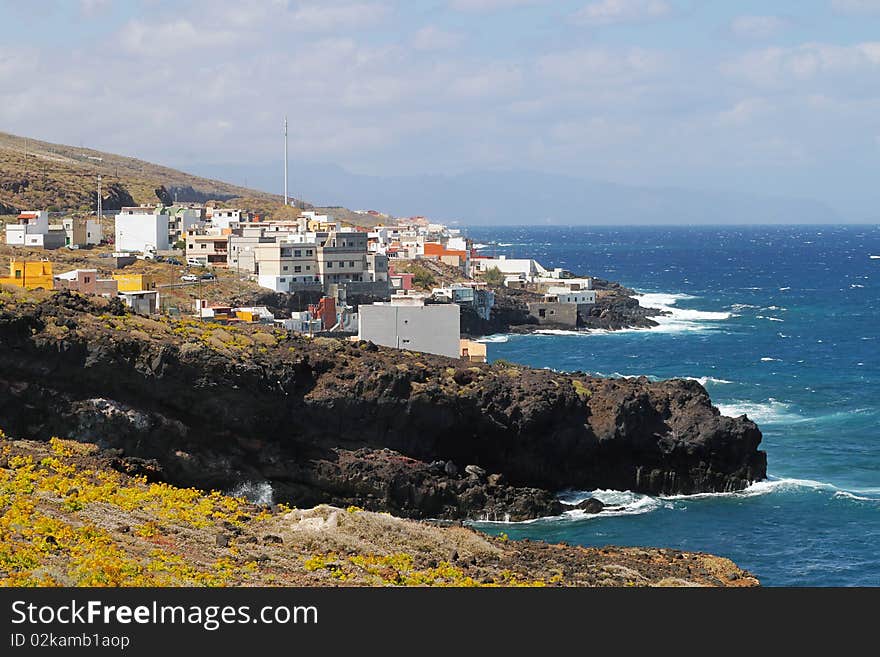 Little village in Tenerife coast and waves