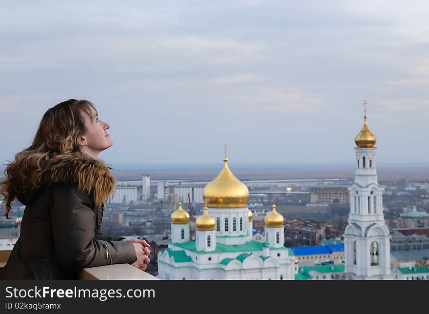 Girl against church. Russia. Rostov-on-Don. A cathedral of the Virgin. Girl against church. Russia. Rostov-on-Don. A cathedral of the Virgin.