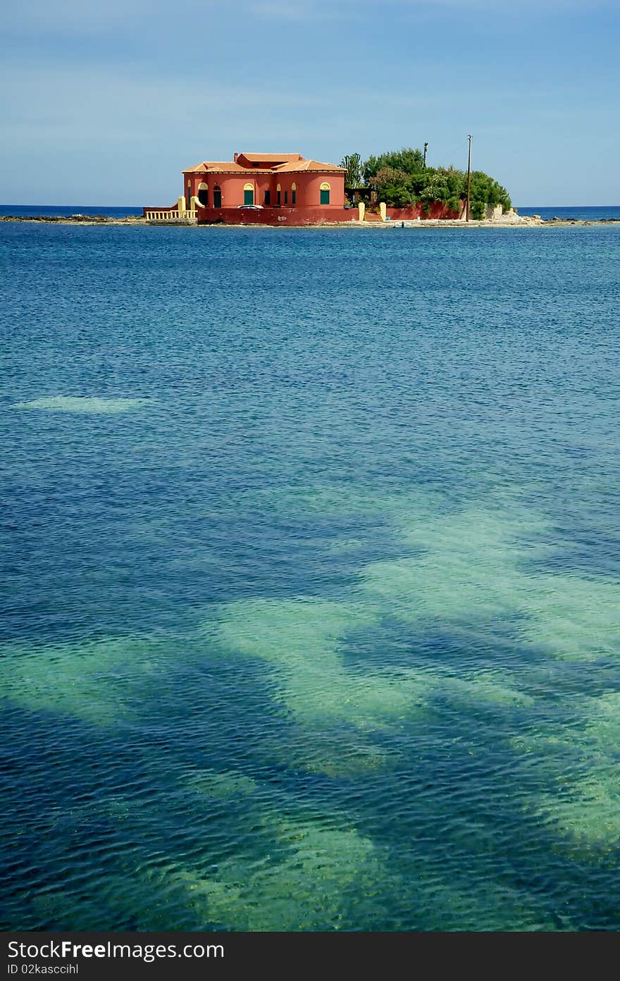 Isolated house on an island in the Mediterranean sea. Isolated house on an island in the Mediterranean sea