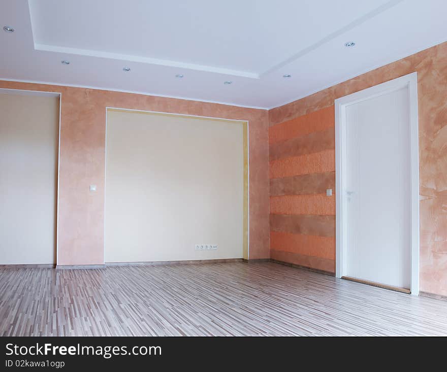 Big living room with wooden floor