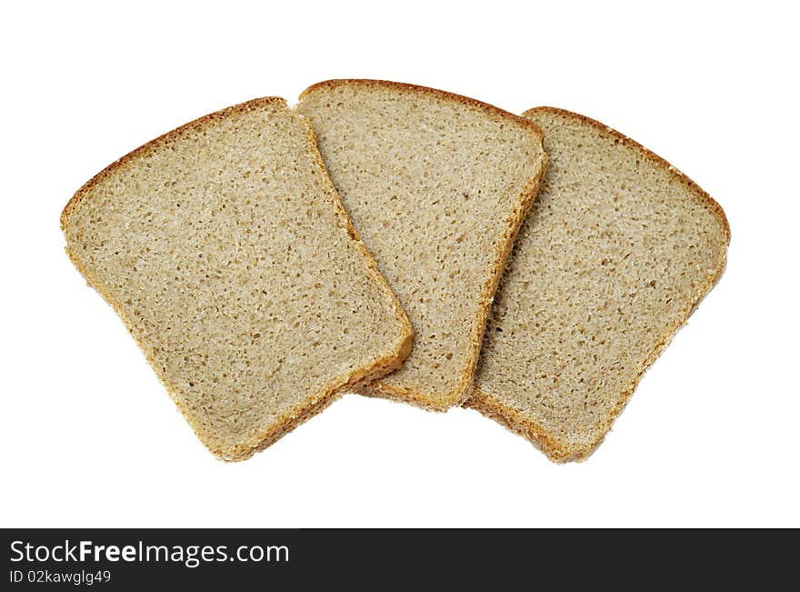 Slices of dark bread isolated over white. Slices of dark bread isolated over white