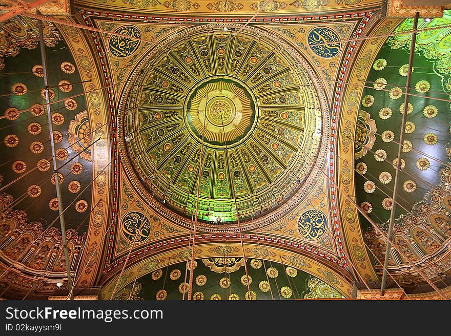 Ornate gilded gold ceiling details at the palace of Citeda, Egypt. Ornate gilded gold ceiling details at the palace of Citeda, Egypt