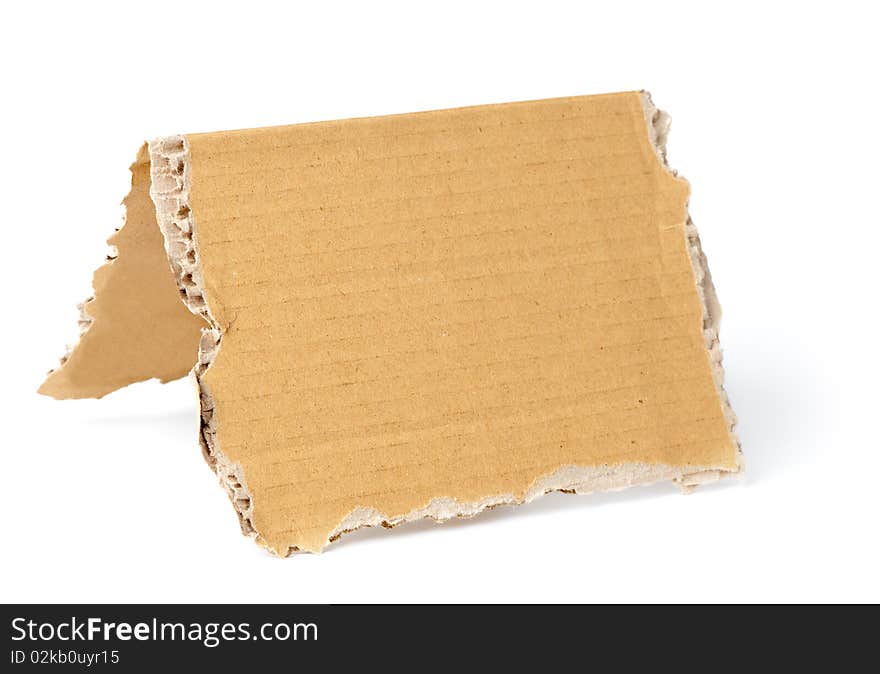 Brown corrugated cardboard sheet isolated on white