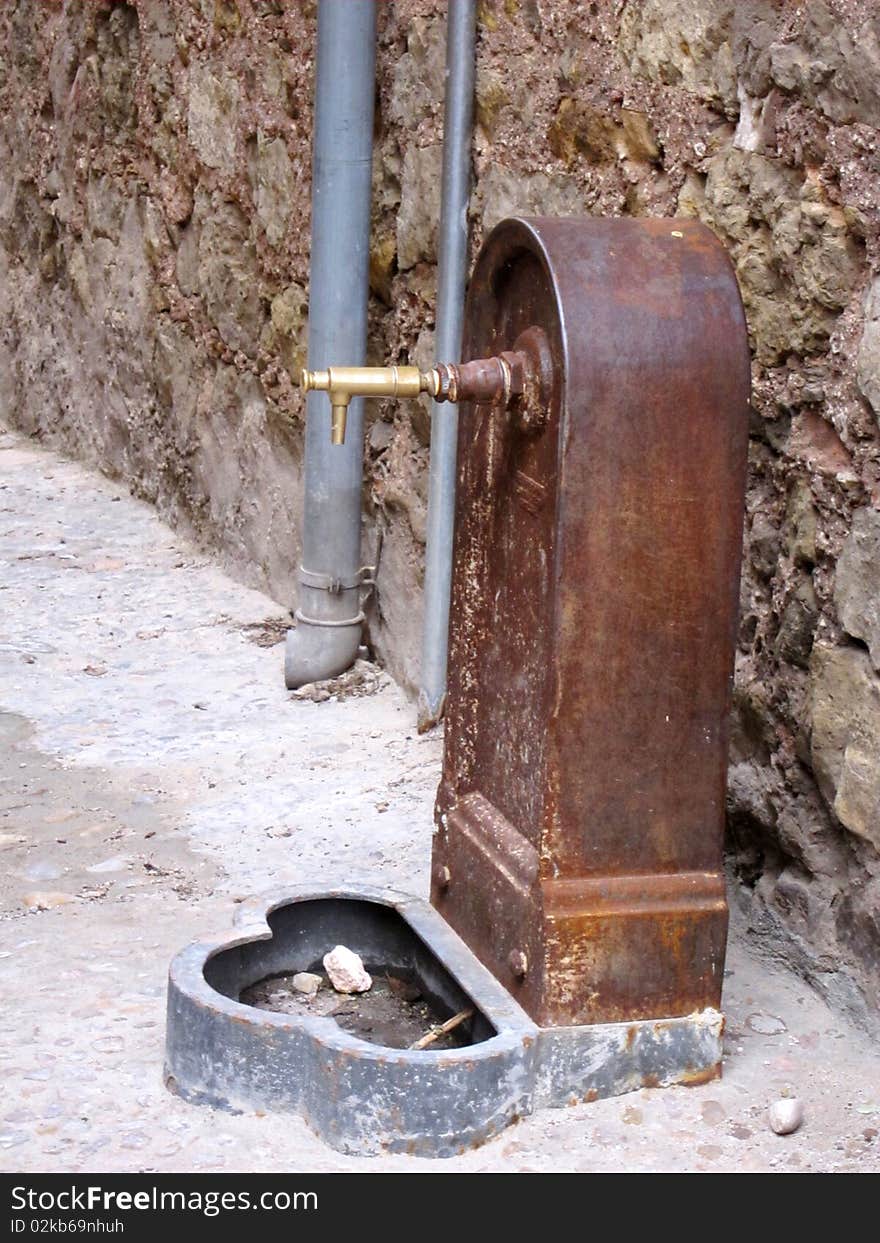 Old water fountain in a Spanish village