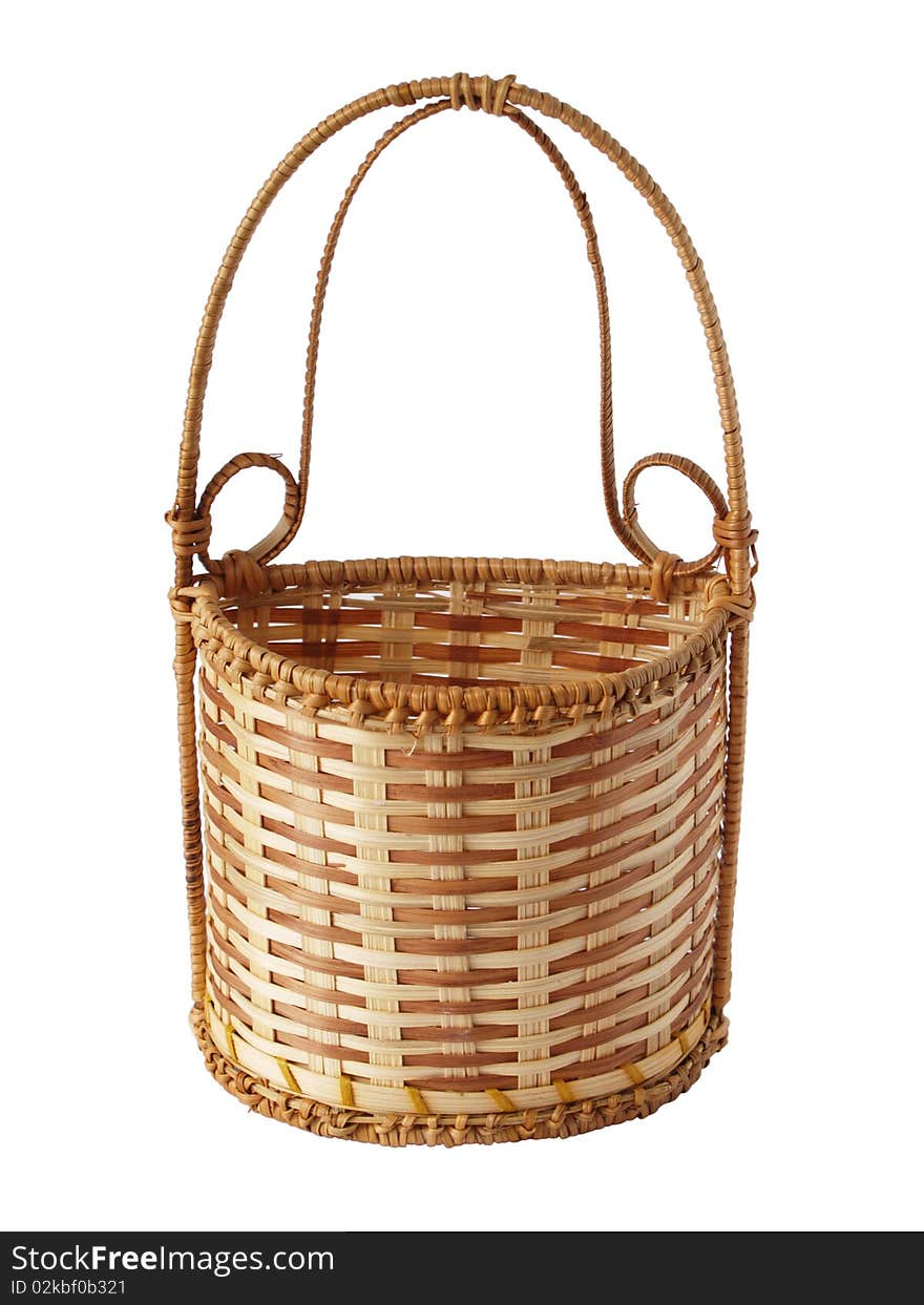 Souvenir small basket from a rod on a white background close up