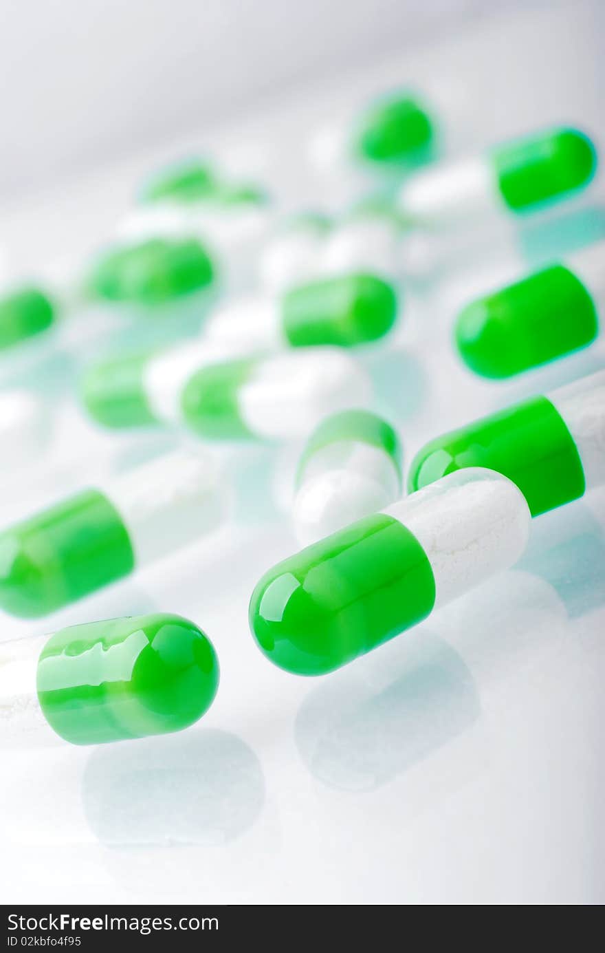 Macro heap of green pills. Macro heap of green pills