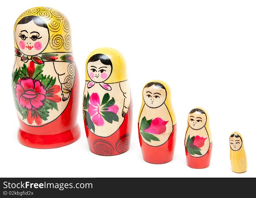 Set from five sets of nesting dolls on white background