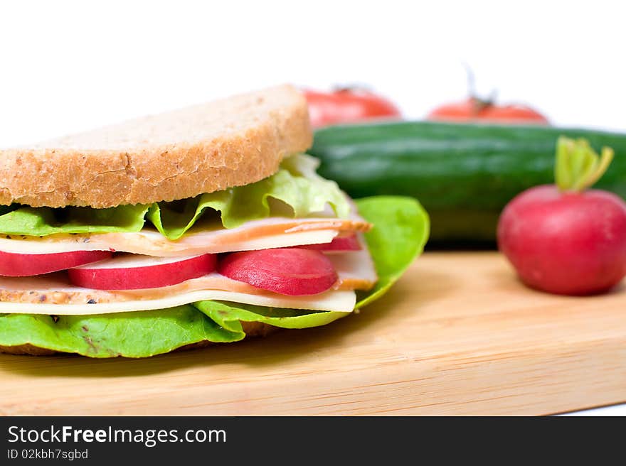 Big and tasty sandwich on a white plate