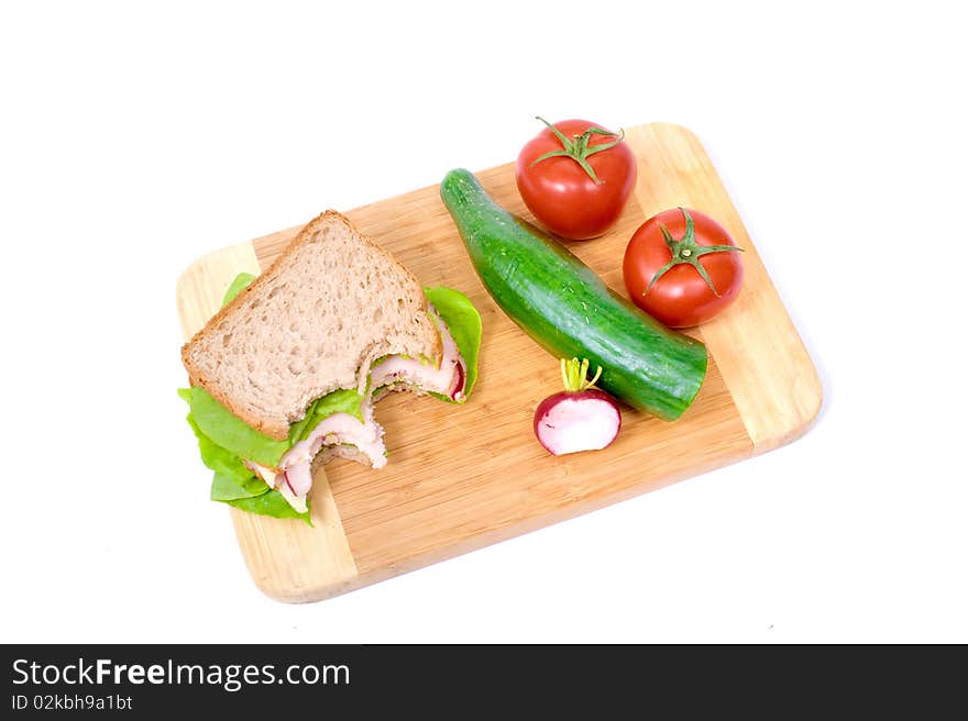 Big and tasty sandwich on a white plate