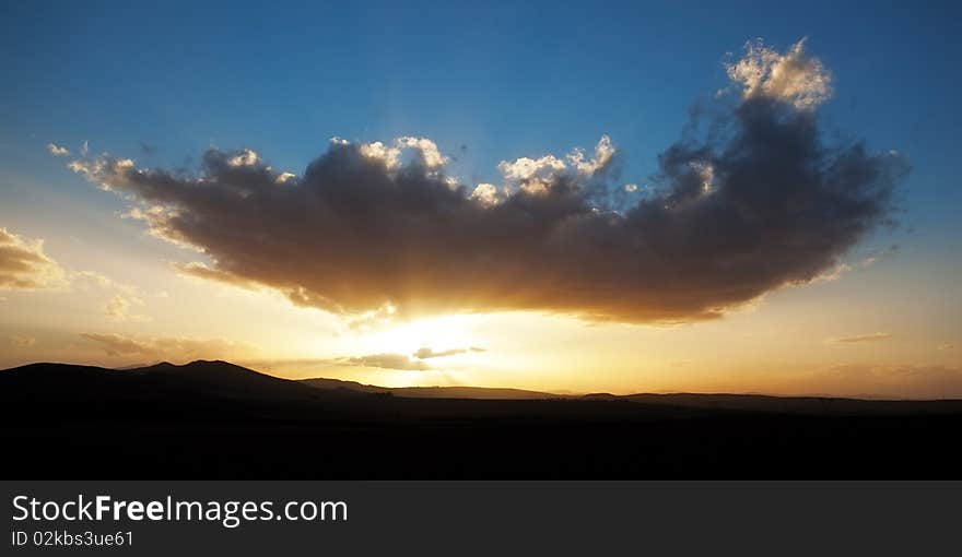 Image of a cloudy sunset in the Cape Province in South Africa. Image of a cloudy sunset in the Cape Province in South Africa