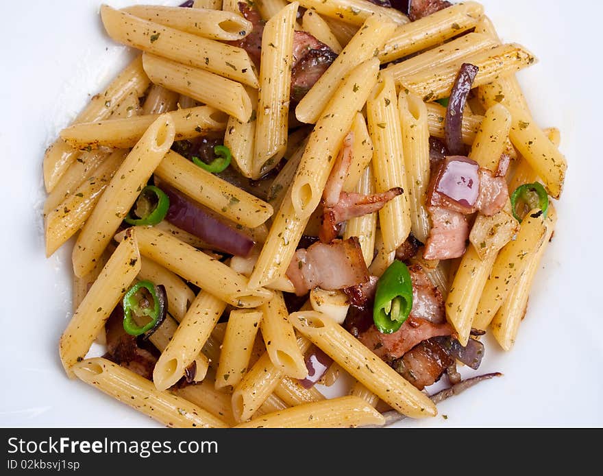 Penne with fried bacon garlic and onion