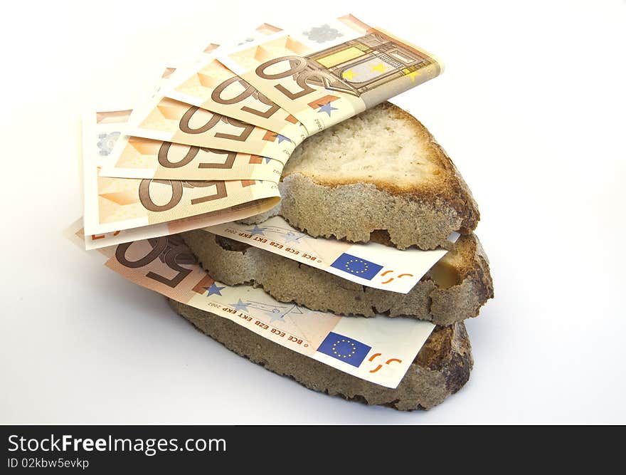 Slices of bread with the money. Slices of bread with the money