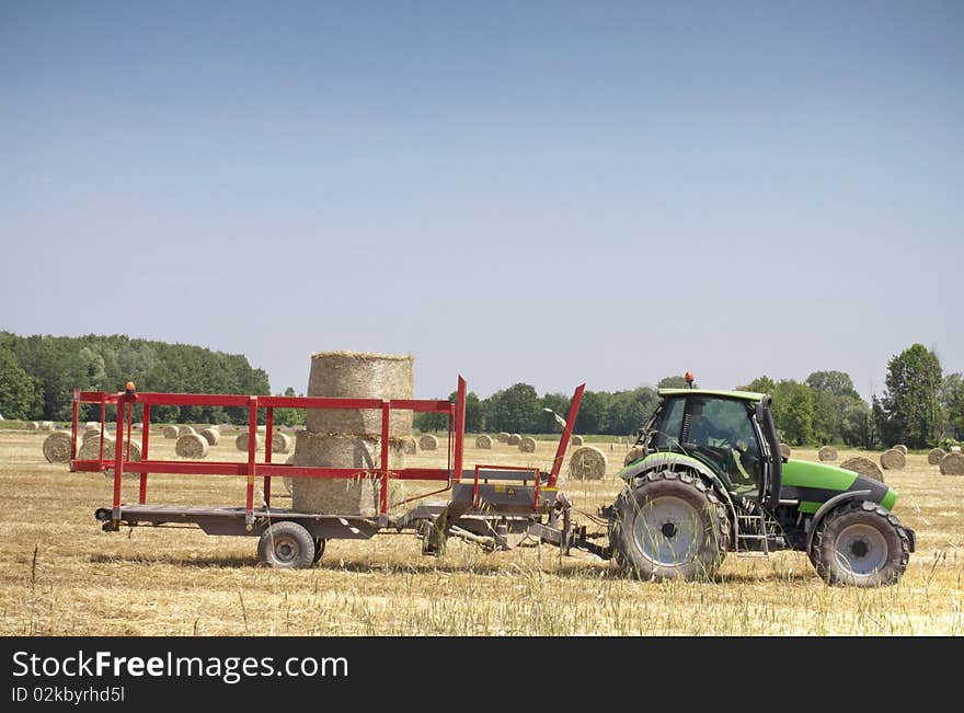 Tractor on hay balls