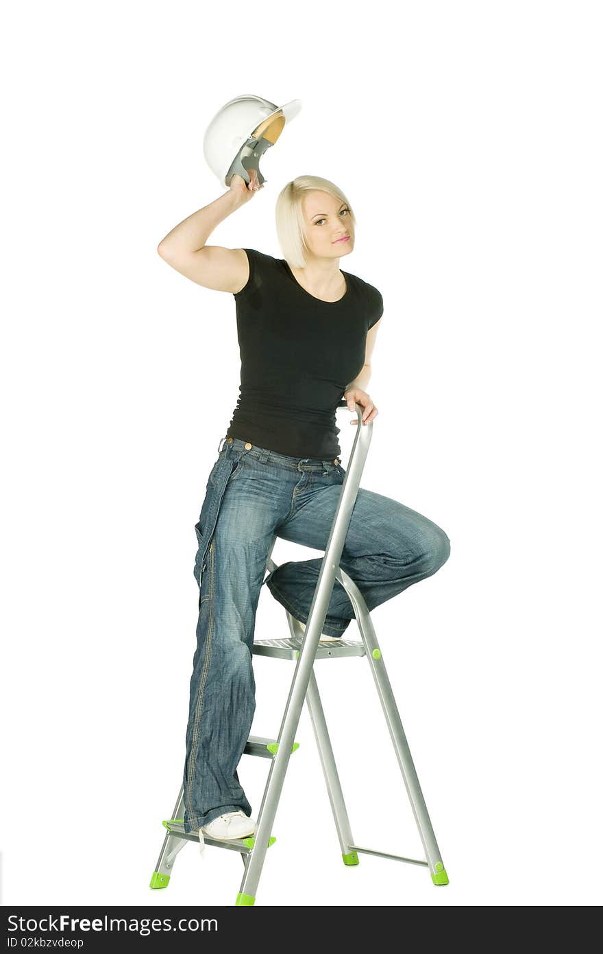 Blonde woman in jeans with helmet in ladder. Blonde woman in jeans with helmet in ladder