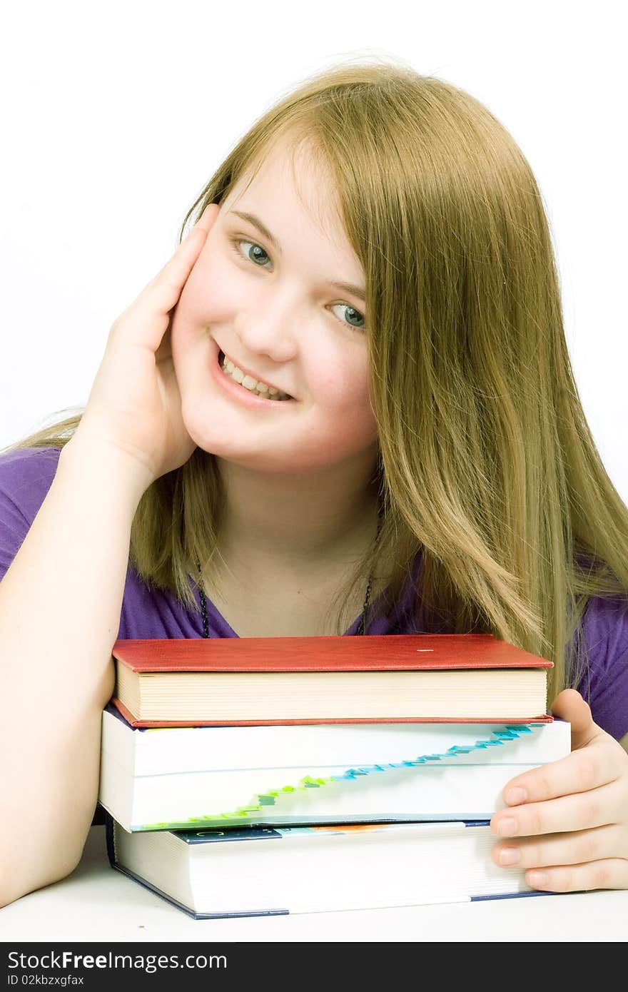 Smiling girl with books