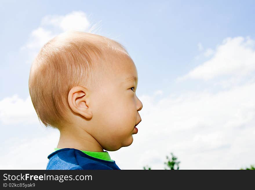 Portrait profile of an adorable Korean multiracial toddler boy. Portrait profile of an adorable Korean multiracial toddler boy.