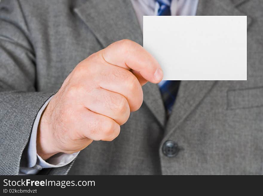 Paper card in hand - business background