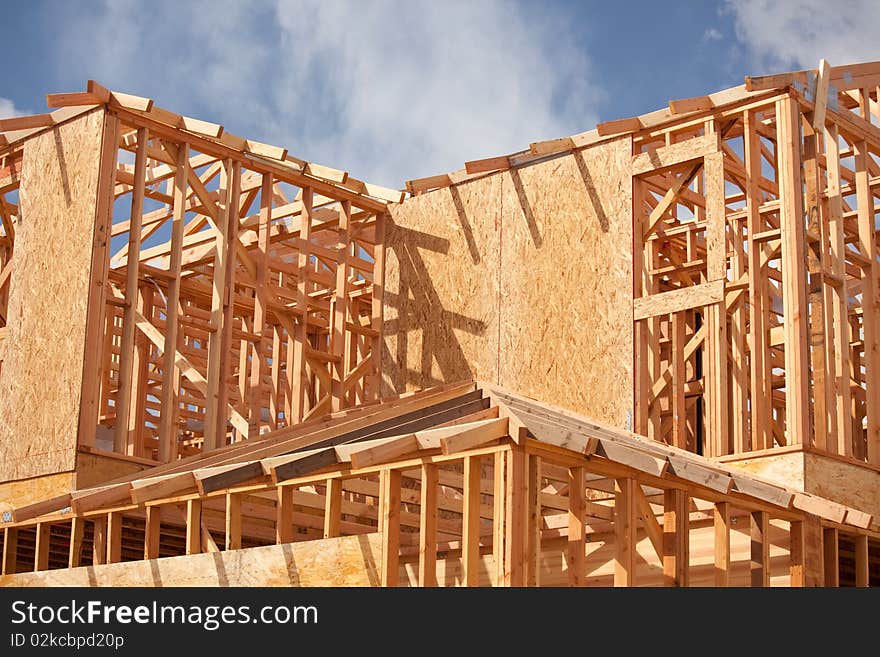 Abstract of New Home Construction Site Framing. Abstract of New Home Construction Site Framing.