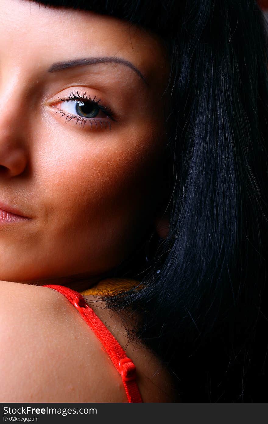 Close-up portrait of young woman with black hair. Close-up portrait of young woman with black hair