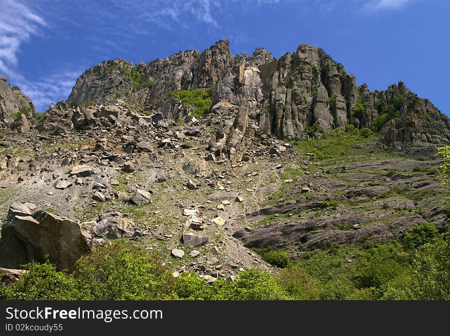 Mountain landscape, rock and stone chaos, against the blue sky