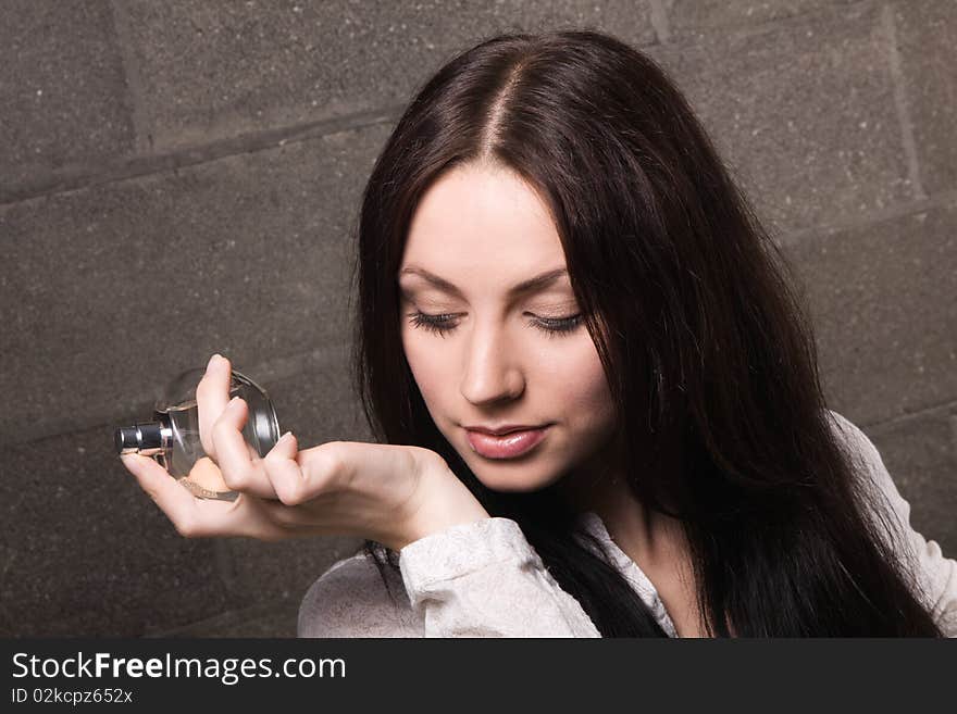 Beautiful Lady With A Bottle Of Perfume