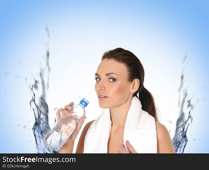 A young and sporty female is drinking fresh water after training. Image isolated on an abstract water background. A young and sporty female is drinking fresh water after training. Image isolated on an abstract water background.