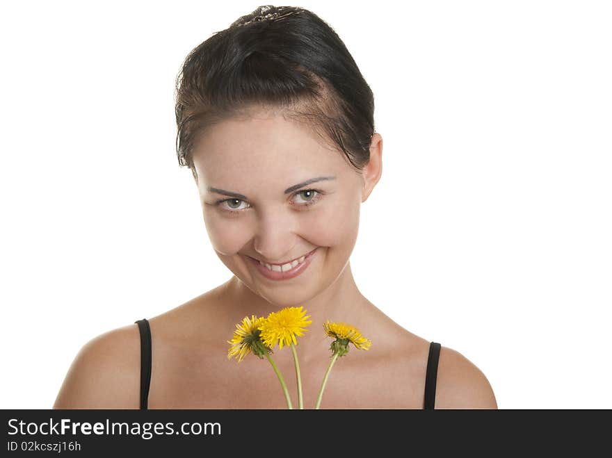 Happy woman with yellow flowers isolated in white