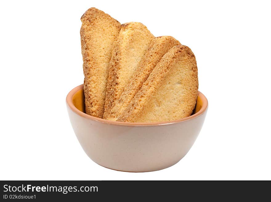 Crackers in a plate it is isolated on a white background