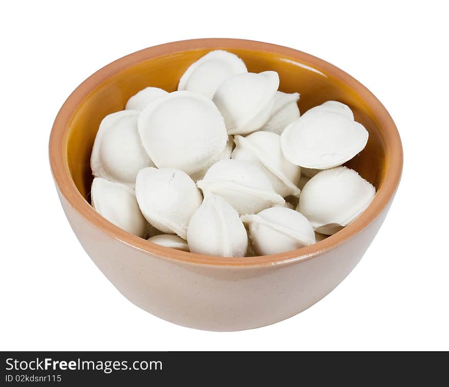 The frozen pelmeni in a plate