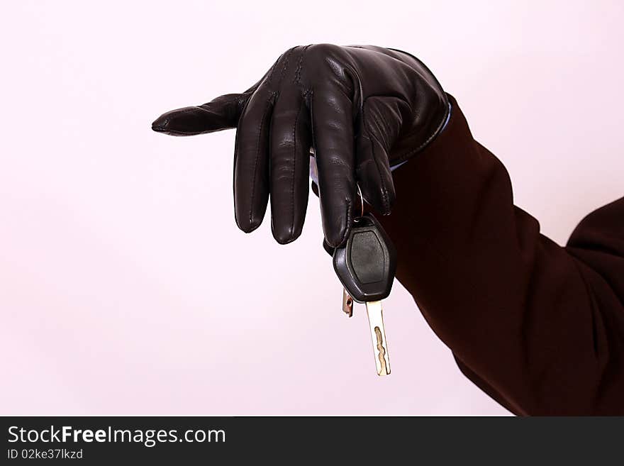 Close up female hand holding a car keys