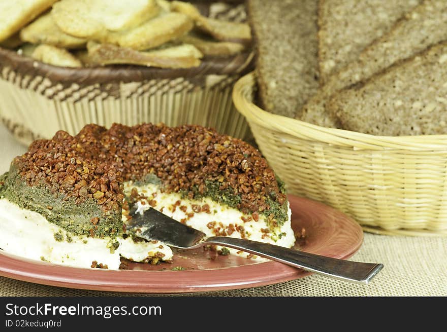 Colorful cheese appetizer with selection of bread