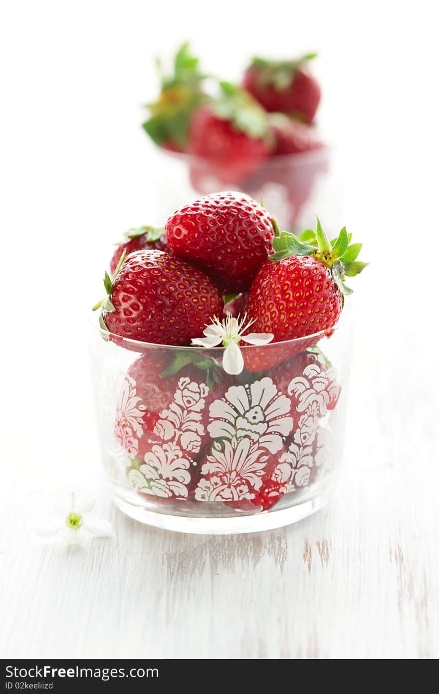 Fresh strawberries in  glasses on the table