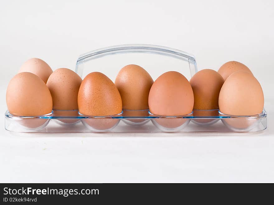 Brown eggs isolated on white background