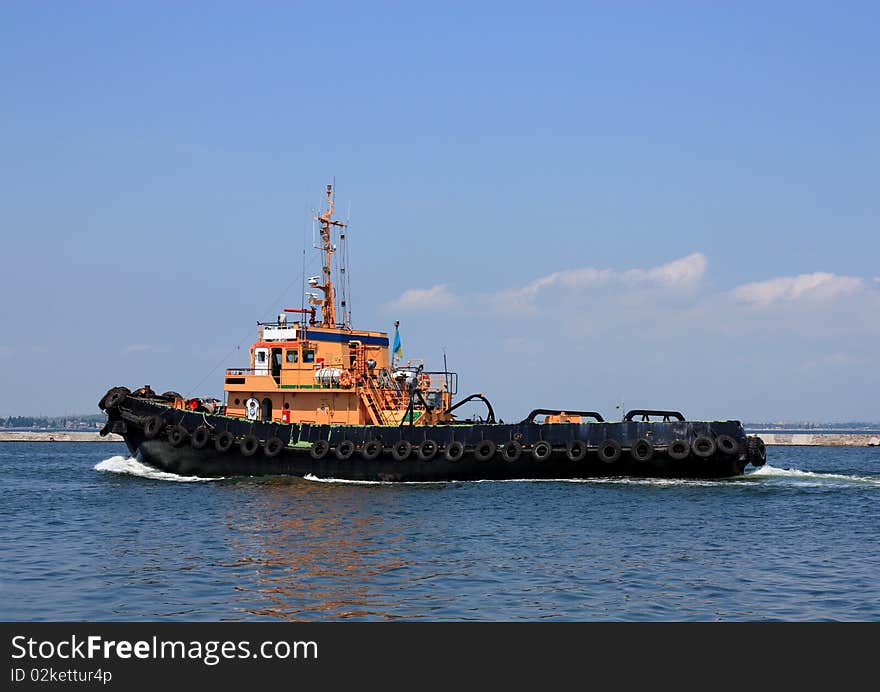 Moving tugboat