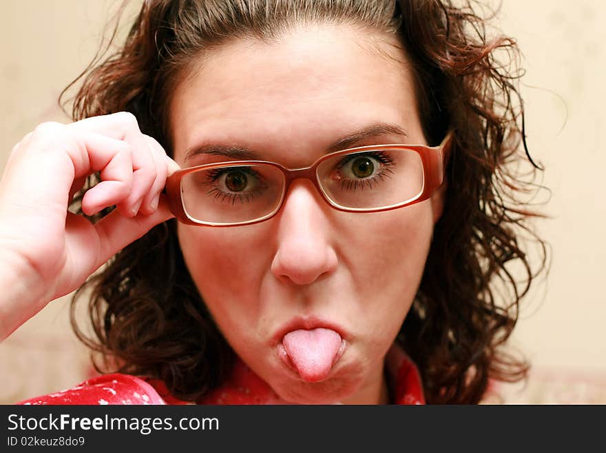 Woman showing tongue