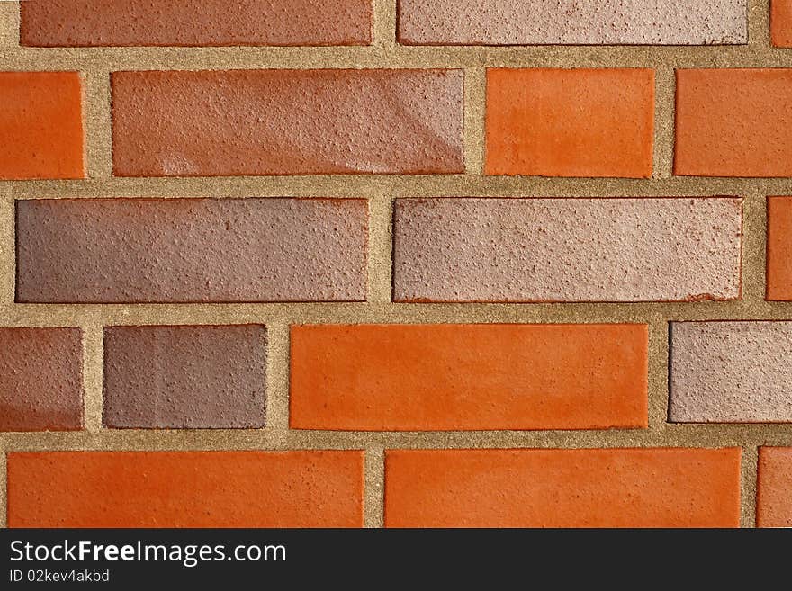 House wall with red stones